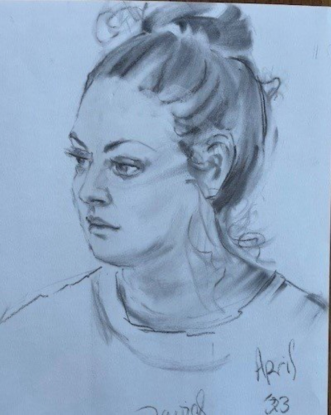 Pencil portrait sketch of a young woman, head study